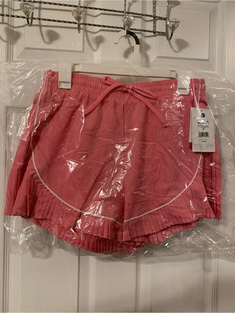 Champion NWT’s collegiate pleated women’s size medium loose skort